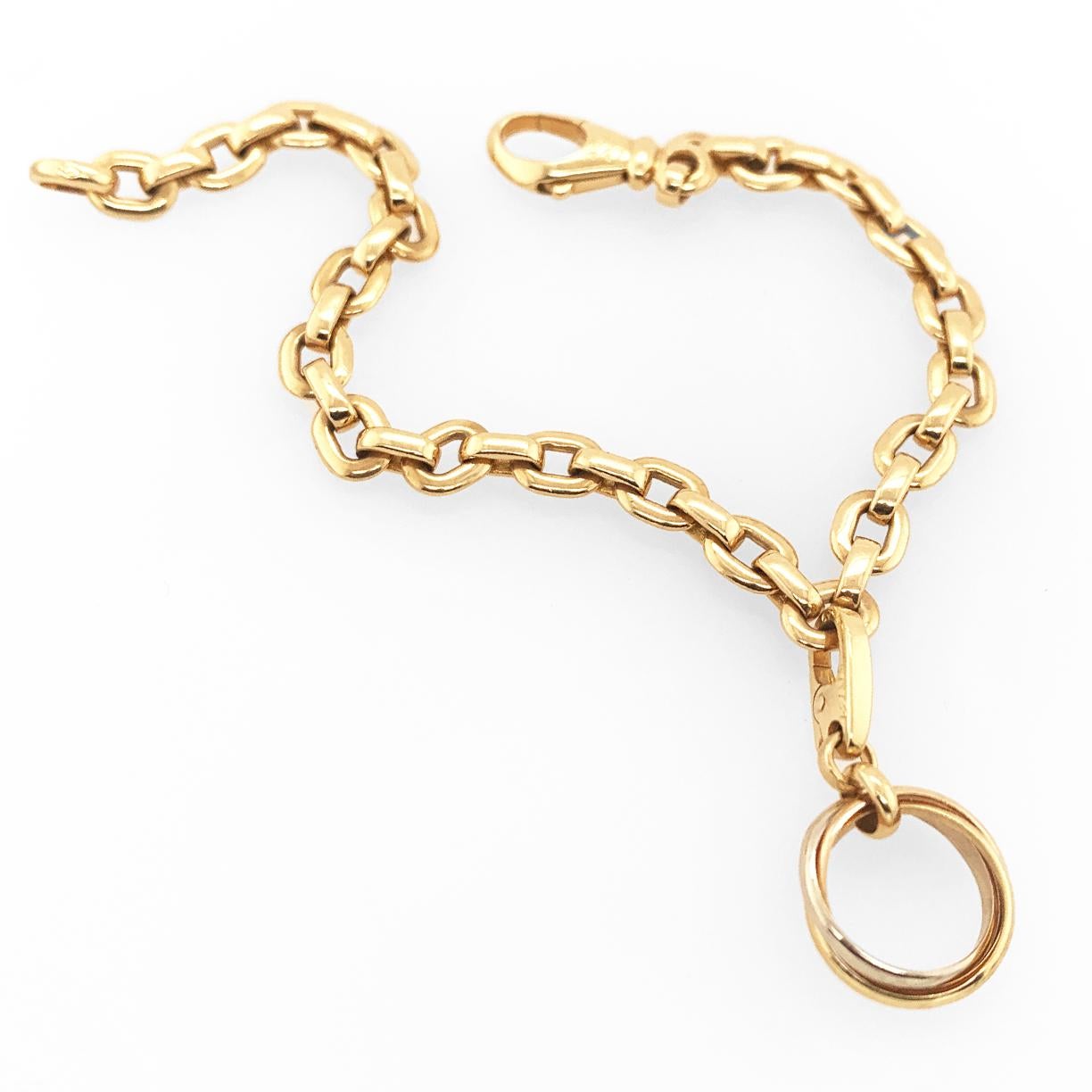 Gold Cartier Trinity Charm Link Bracelet and Charm In Excellent Condition In New York, NY