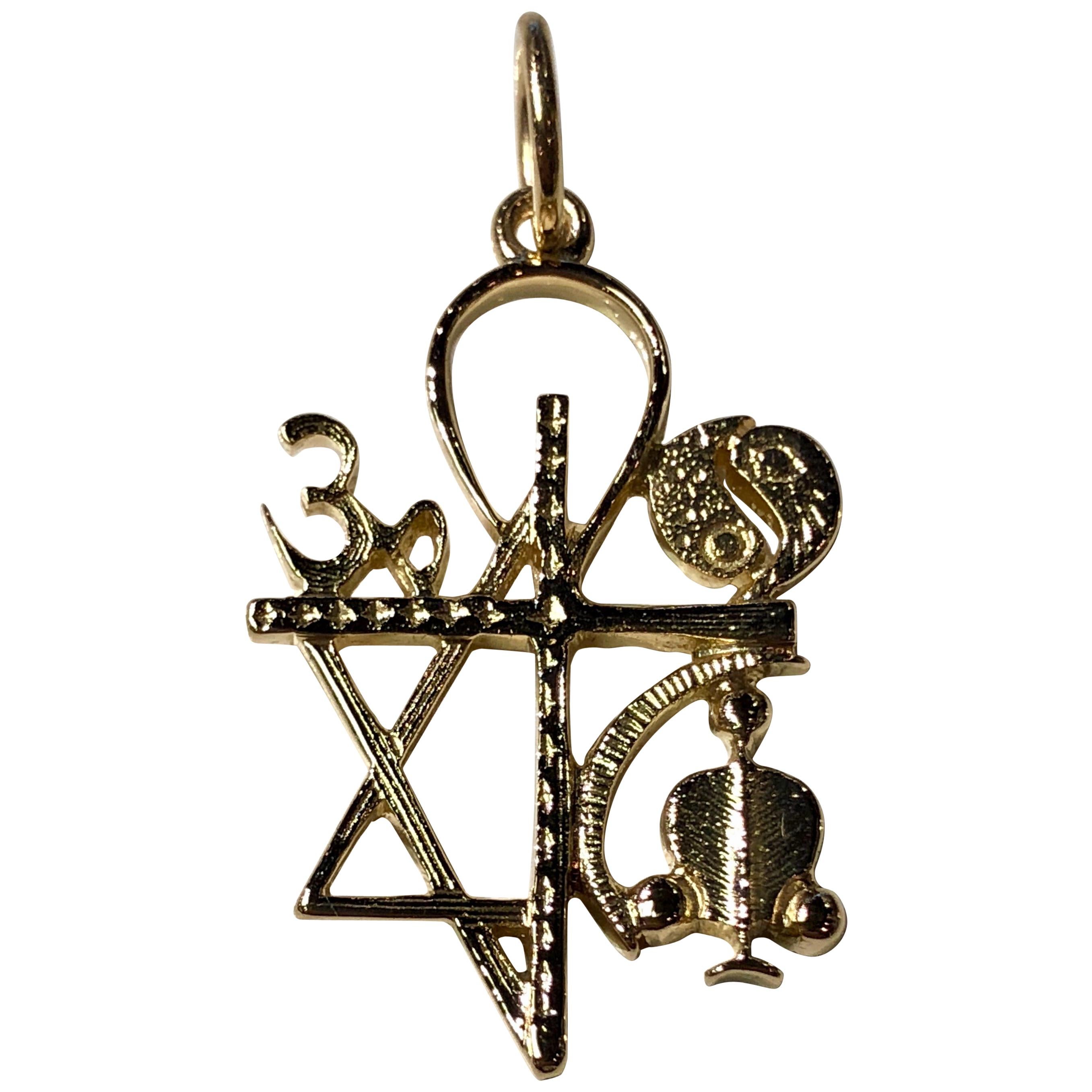 Gold Cartier World Religions Pendant