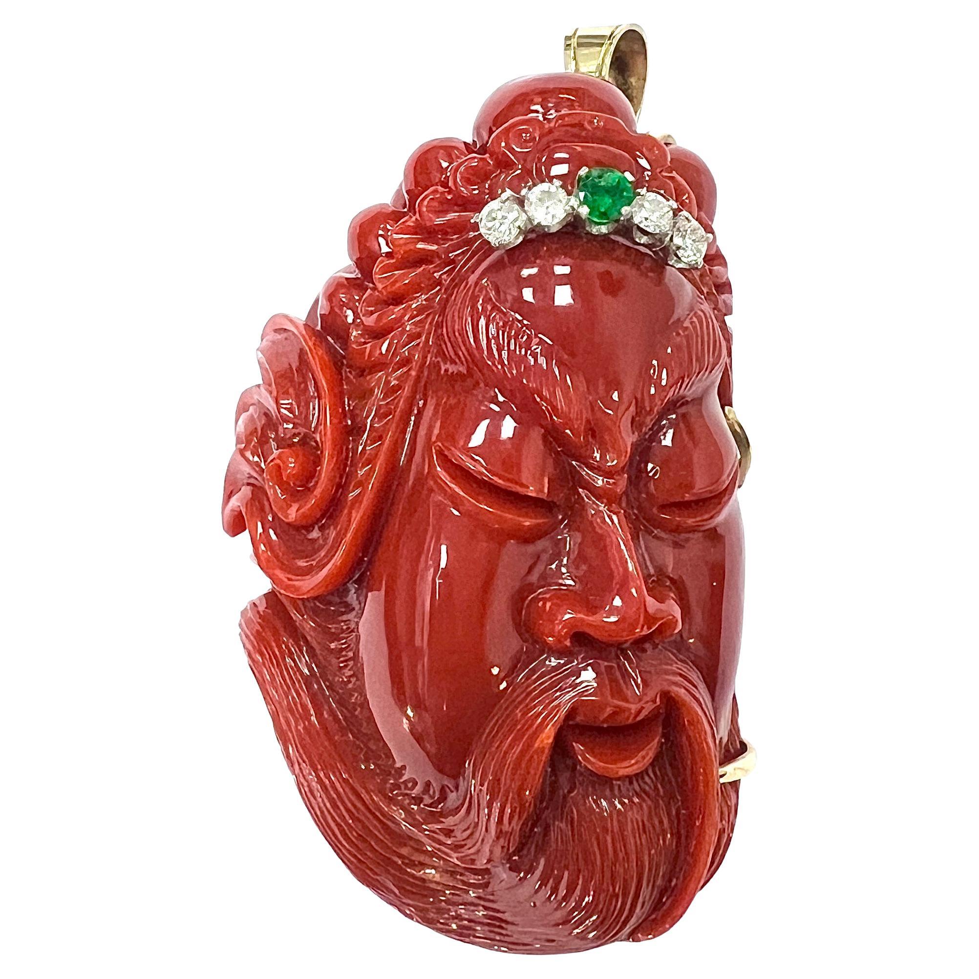 Gold carved oxblood coral diamond and emerald pendant brooch