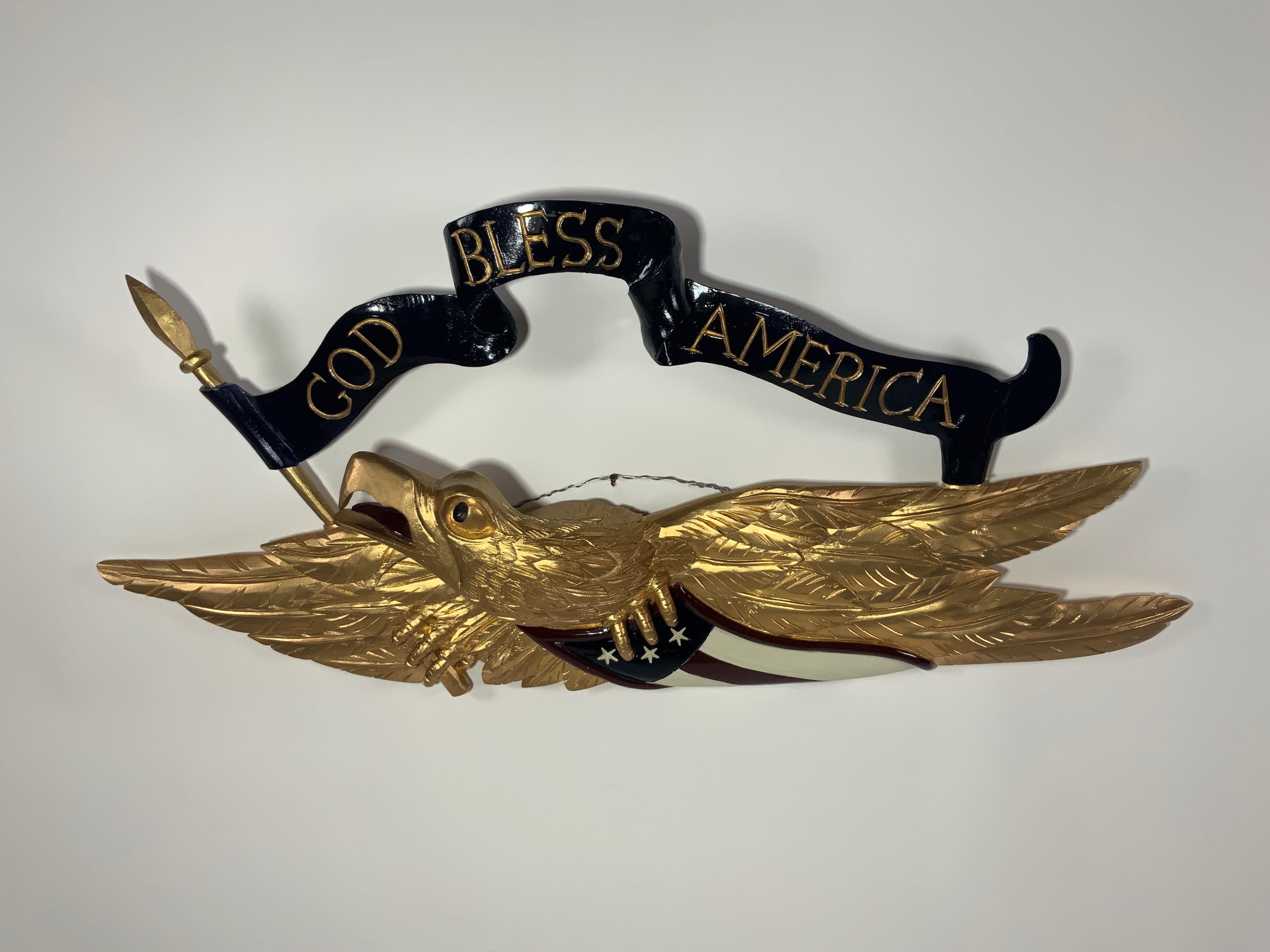 Carved American wooden eagle. Painted gold. 