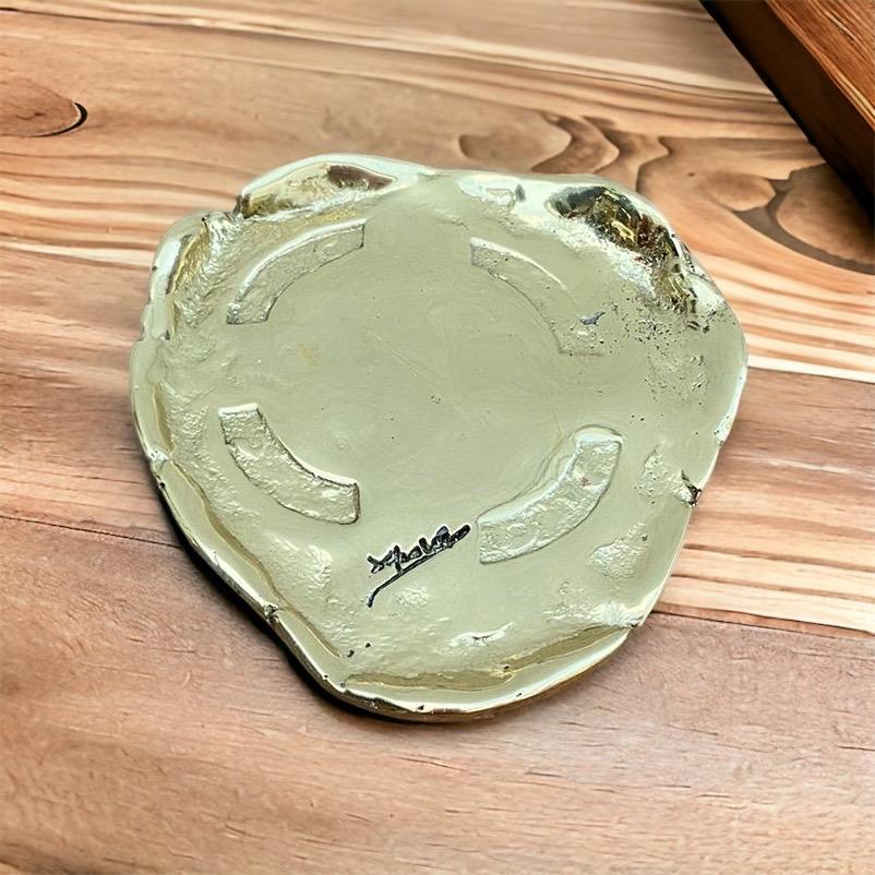 The decorative Celtic Coaster was created by David Marshall, it is made of  sand cast brass. We can engrave this piece with your Initials or Logo, makes a beautiful Wedding or Company Gift.
Handmade, mounted and finished in our foundry and workshop