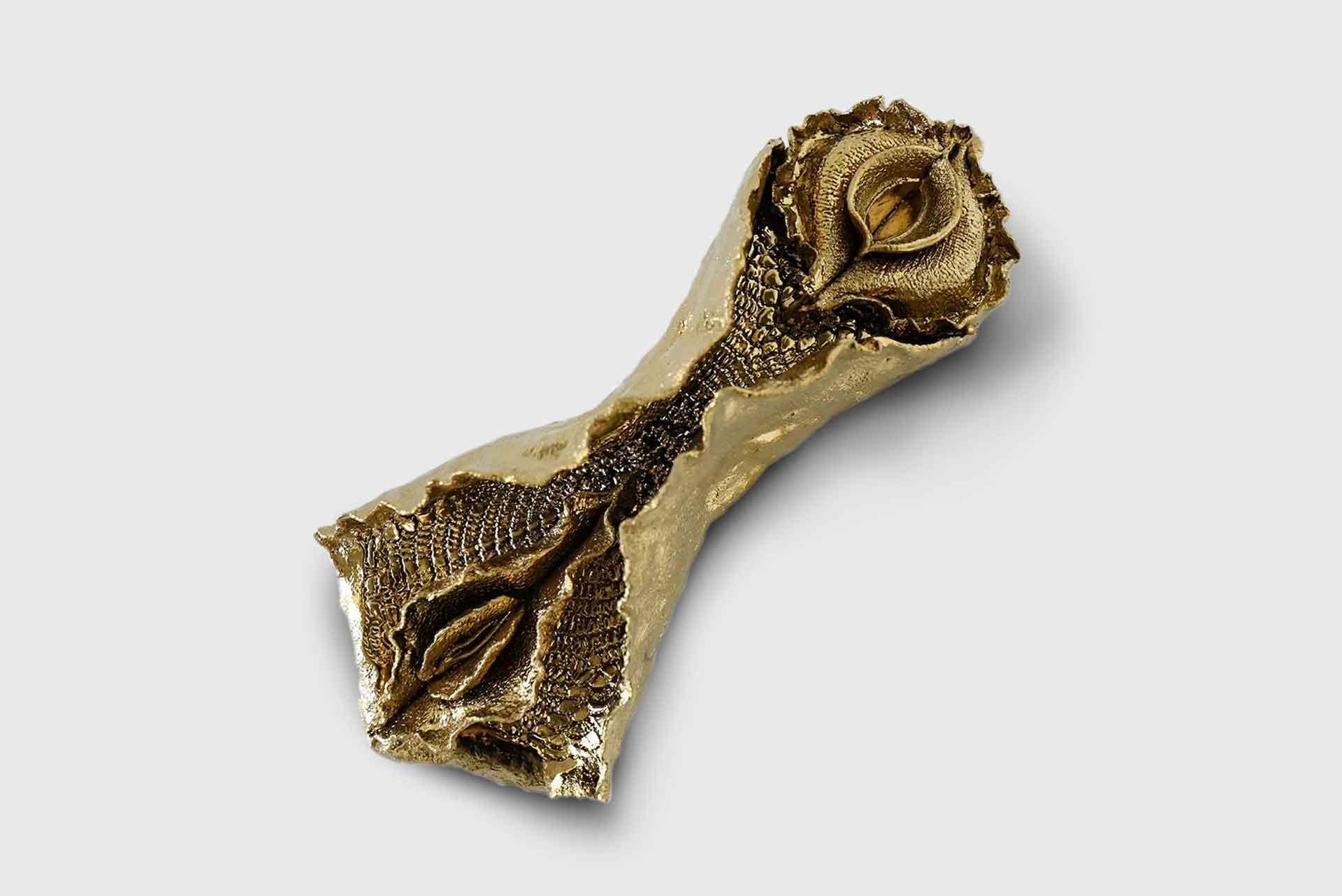 Ceramic wall piece model #12
Manufactured by Liu Xi
China, 2021
Ceramic, gold chroming

From the series “Our God is Great” Liu Xi’s gilded ceramic sculptures hang with their particular floral and vulval forms in full view of the spectator. The