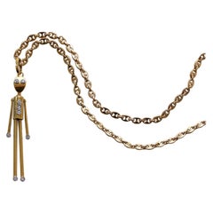 Gold Chain and Stick Man's Pendant