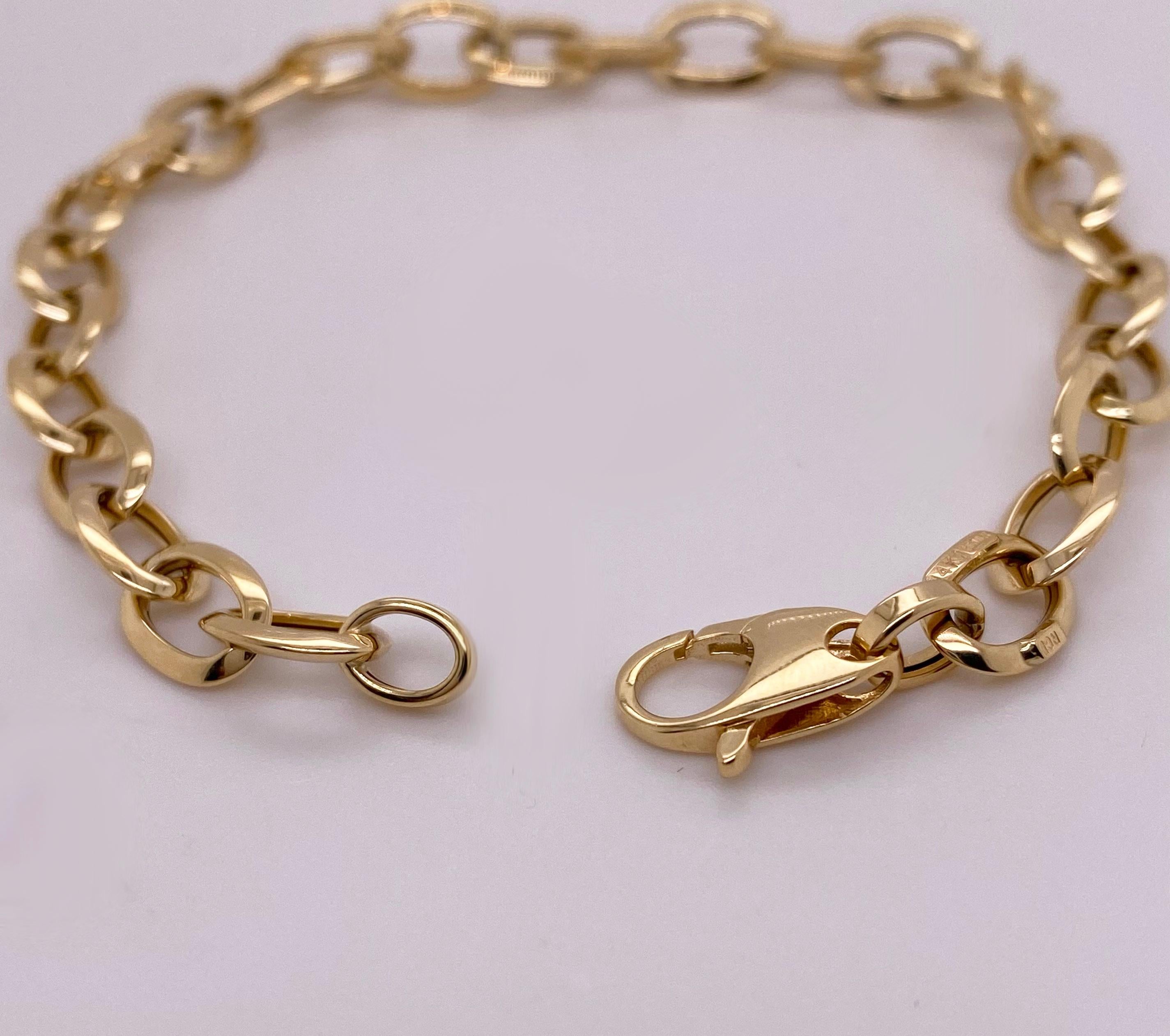 Gold chains are back and better than ever! This 14 karat yellow gold chain bracelet is one of the top trending chain designs in fashion jewelry! The gold cable chain is a wide design that adds weight to any 
The details for this gorgeous bracelet