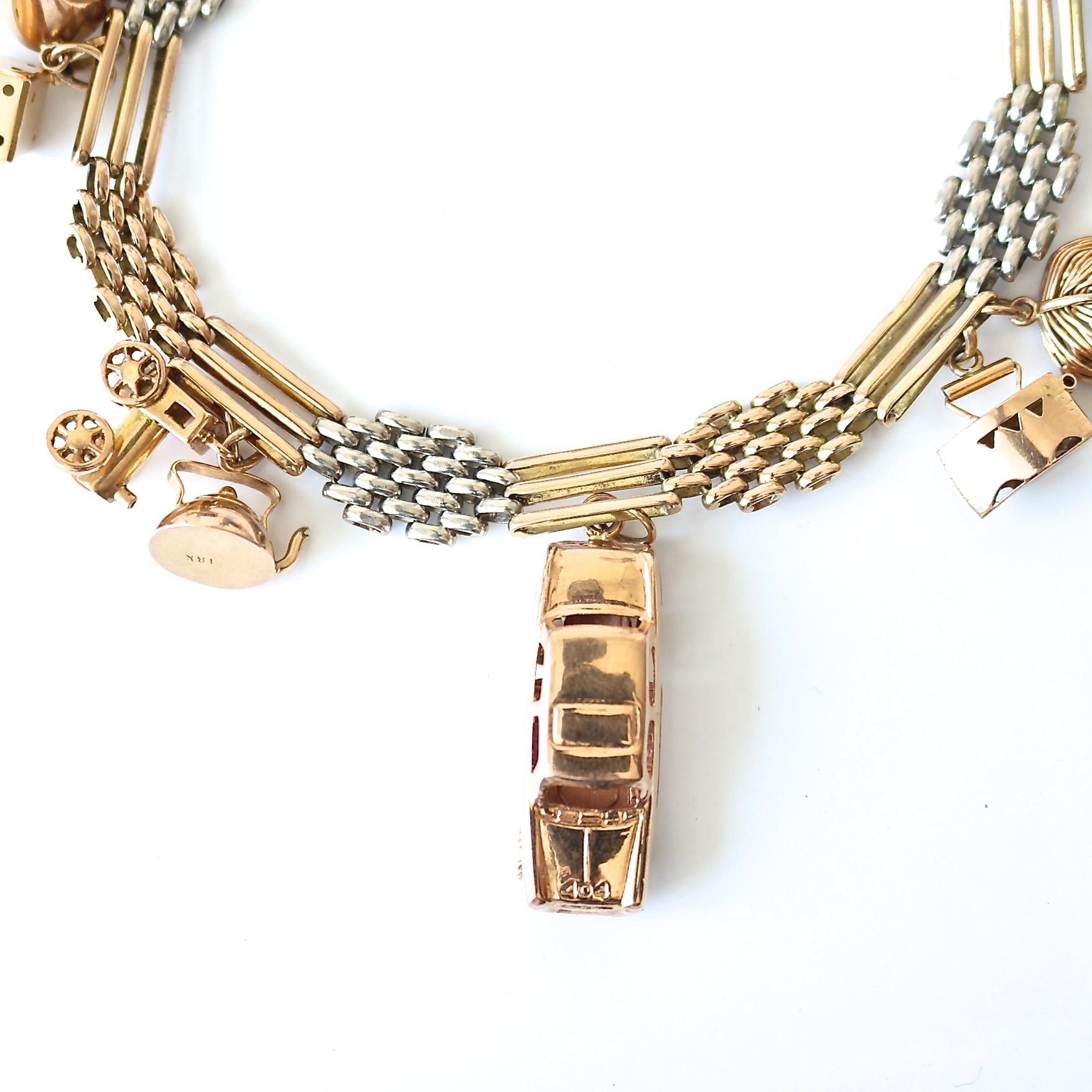 Gold Charm Bracelet In Excellent Condition In Beverly Hills, CA