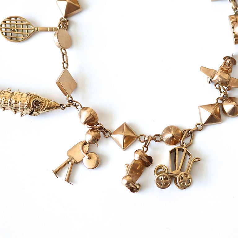 Gold Charm Bracelet For Sale at 1stDibs