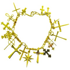 Gold Charm Bracelet of 18 Different Crosses