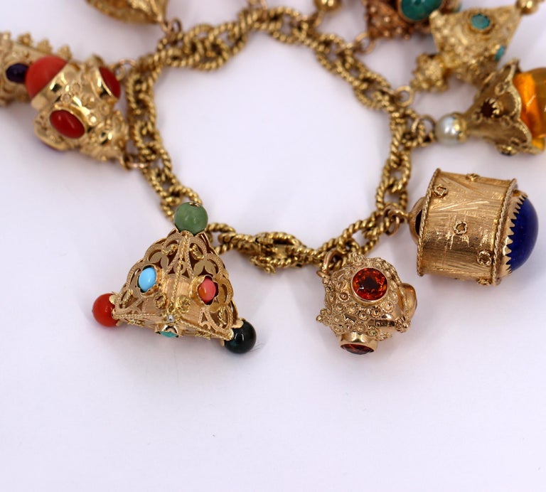 Gold Charm Bracelet with Eleven Charms with Assorted Stones at 1stDibs