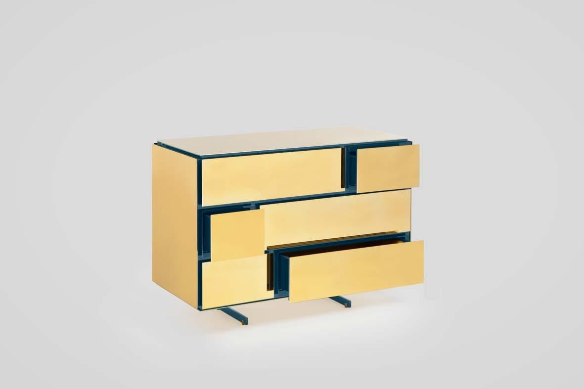 Gold chest of drawers by SEM.
Dimensions: W 104 x D 50 x H 78 cm.
Materials: polished or fine brushed rose gold plated, inlays in lacquered wood, lining of drawers in mohair velvet.

SEM is a new brand of home furnishings, designed and produced