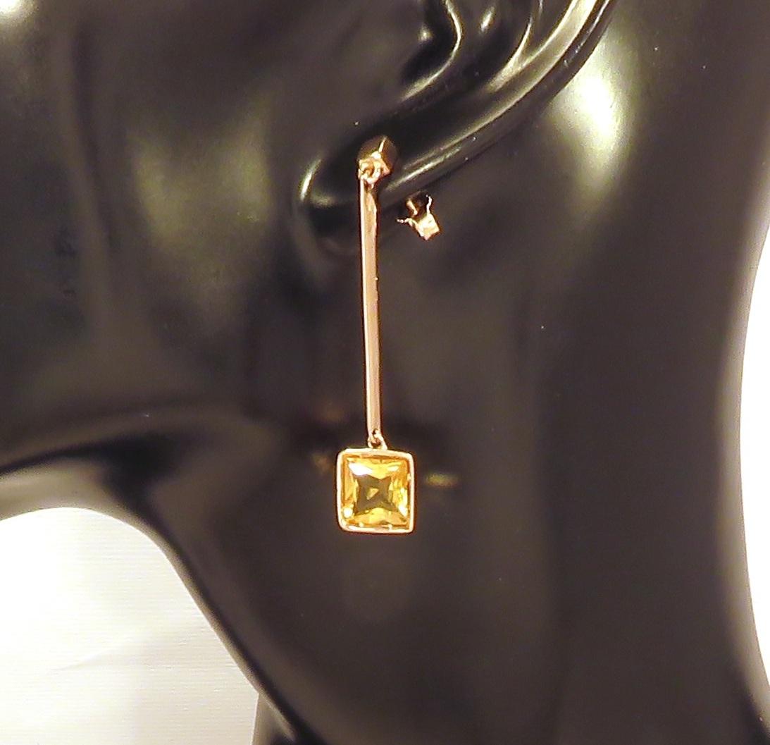 Elegant pair of dangle earrings for any occasion with square cut natural gold citrine and rose gold stud closure. The length of each earring is 48 mm / 1.889 inches. Handcrafted in 9 karat rose gold and marked with the Italian Gold Mark 375 and