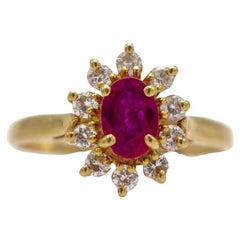 Bague à grappes d'or avec rubis et diamants, France, milieu du XXe siècle.