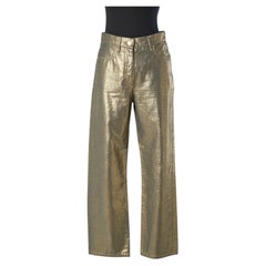 Gold coated jean with branded button and studs Chanel 