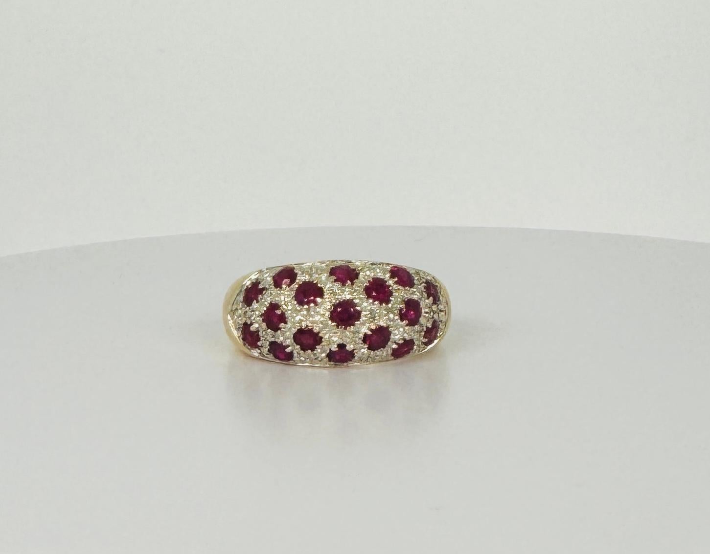 Absolutely breathtaking ring. This second-hand cocktail ring will give you a sophisticated and beyond elegant look.  This gem is made of 18-carat yellow gold. The rubies are truly refined and will certainly sparkle on your finger with all the