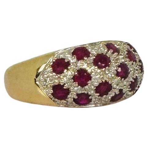 Gold cocktail ring with 32 diamonds and 17 rubies For Sale