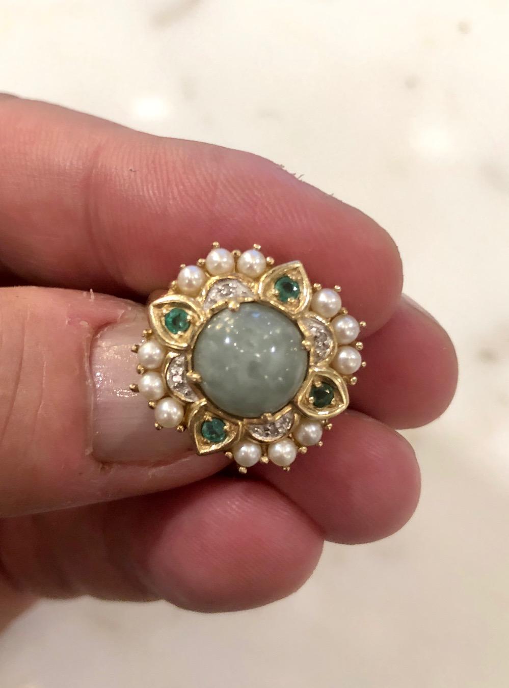 Square shape cocktail ring with center pale green jade surrounded with fresh water pearls, diamonds and emeralds. Size US 8,5