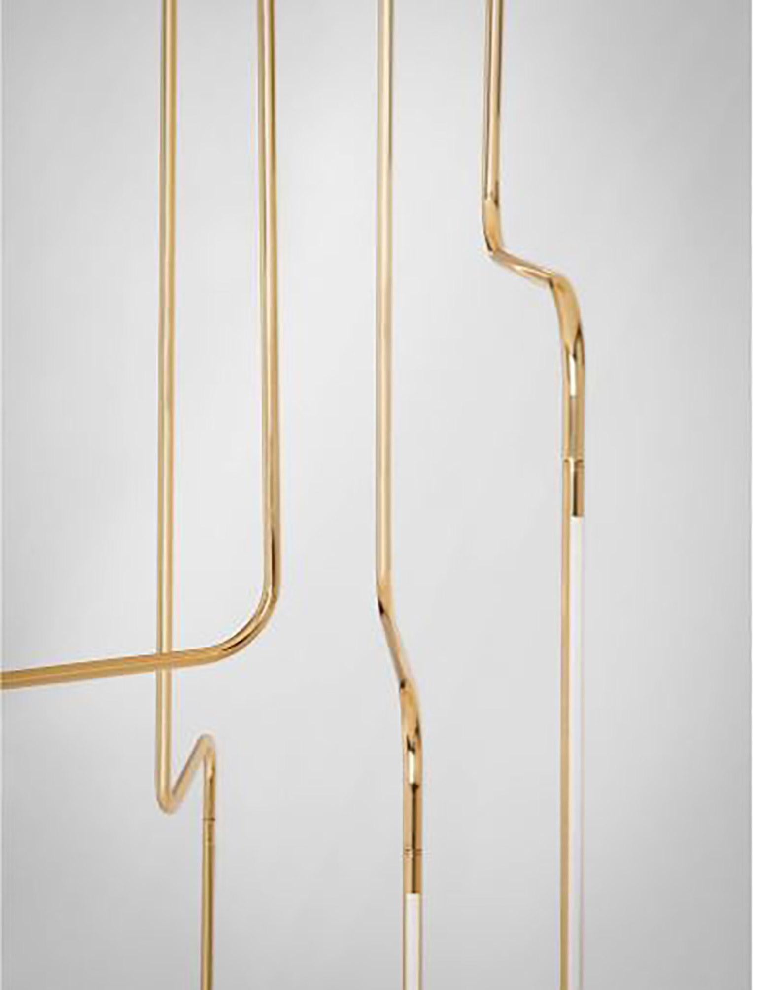 SEM Gold collection, four arms composition ceiling lamp in polished or fine brushed tubular brass with the double joint. Different sizes and compositions: H 110/155/175 cm. Horizontal arm length measurement of 20 cm. Lamp type LED 6W - 3000°K