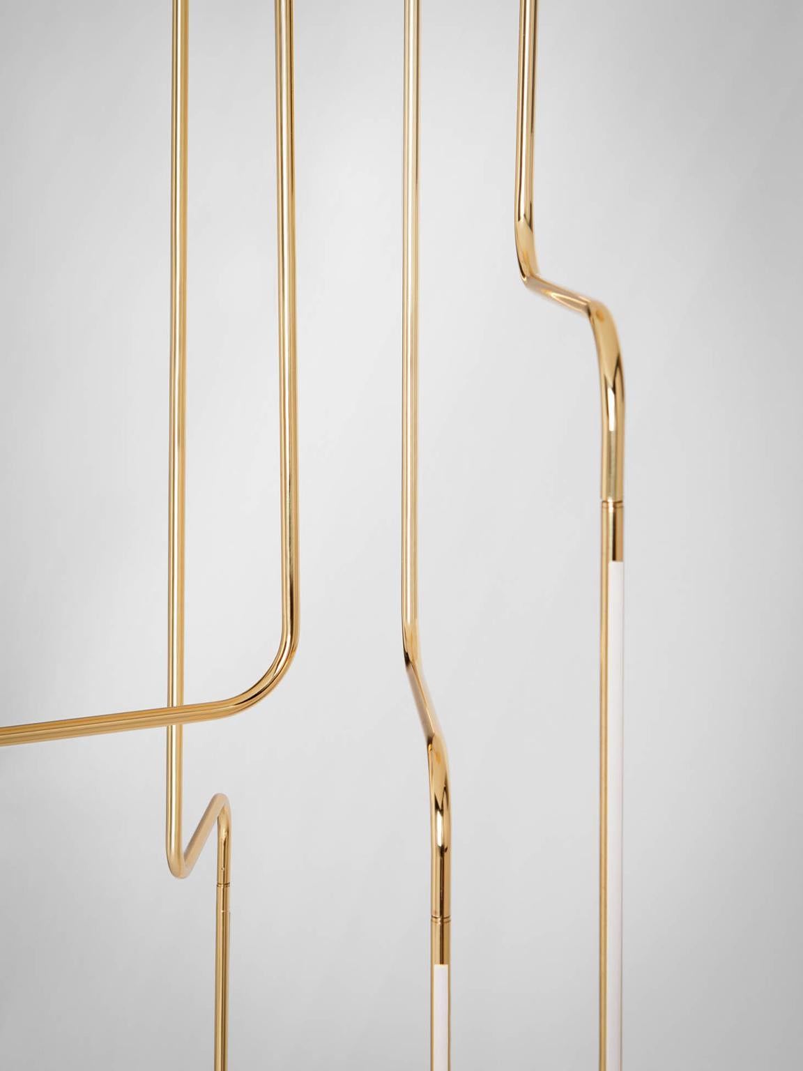 SEM Gold collection, four arms composition ceiling lamp in polished or fine brushed tubular brass with double joint. Different sizes and compositions: H 110/155/175 cm. Horizontal arm length measurement 20 cm. Lamp type LED 6W - 3000°K Voltage