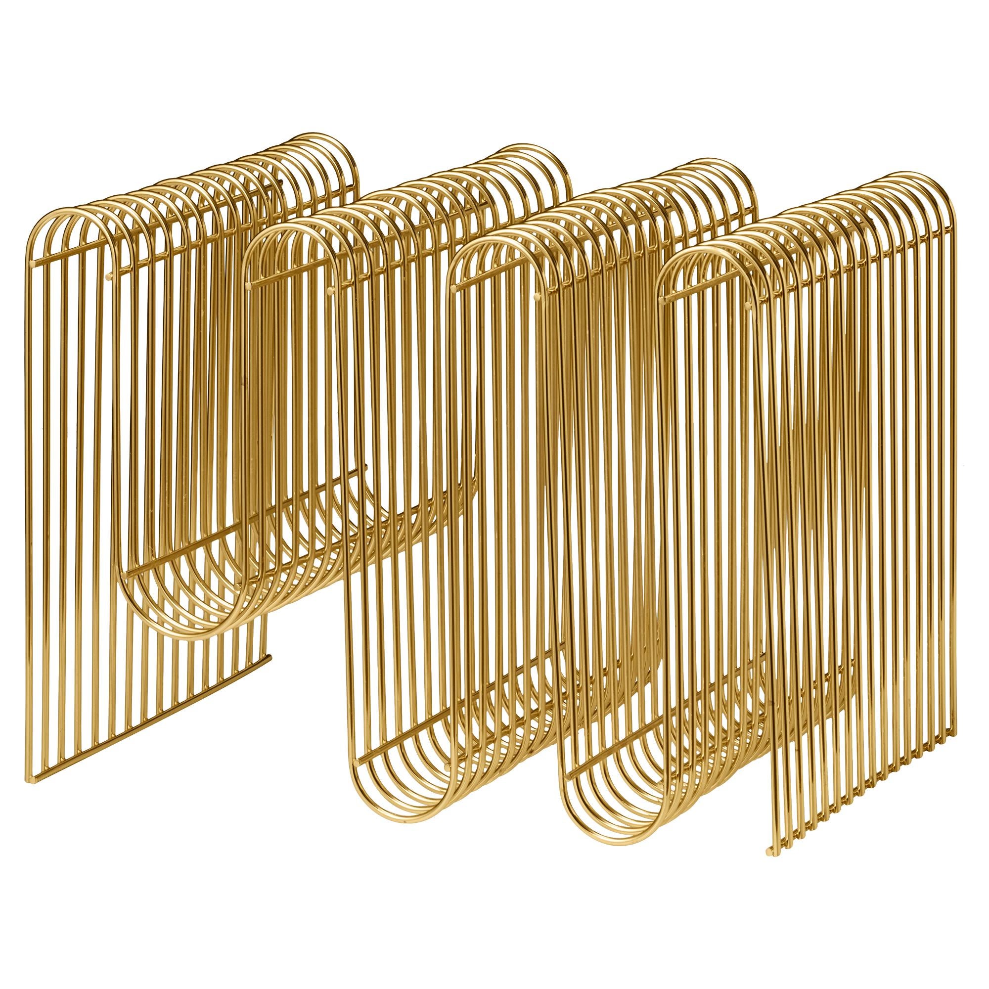 Gold contemporary magazine holder
Dimensions: L 40.5 x W 30.3 x H 30.3 cm 
Materials: Steel.
Also available in Silver and Black. Please contact us for more information. 


The design of the Curva magazine holder has become an instant icon. The