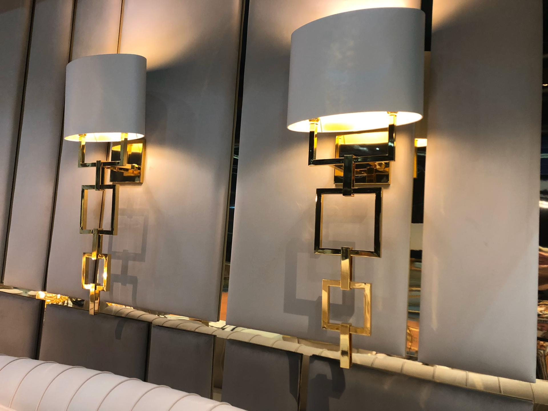 The gold contemporary wall lamp is the ultimate statement of superior design meeting modern living. Ideal for lovers of lighting, in fact a necessity. The finest in great visual design. A touch of sophistication designed for diffused or downward