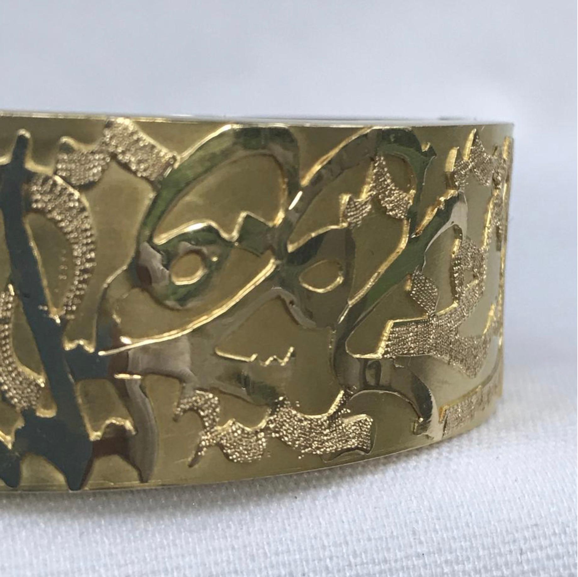BRAND - Custom Made in Cairo Egypt

CONDITION - Exceptional!

SKU - 1365

ORIGINAL RETAIL - $7,000 + tax

DIMENSIONS - 2.6 x .9 x 2.25, 57.7 grams or 2.04 oz

CLOSURE TYPE - Clasp

MATERIAL - Gold - 18k - tested for purity, authentication can be