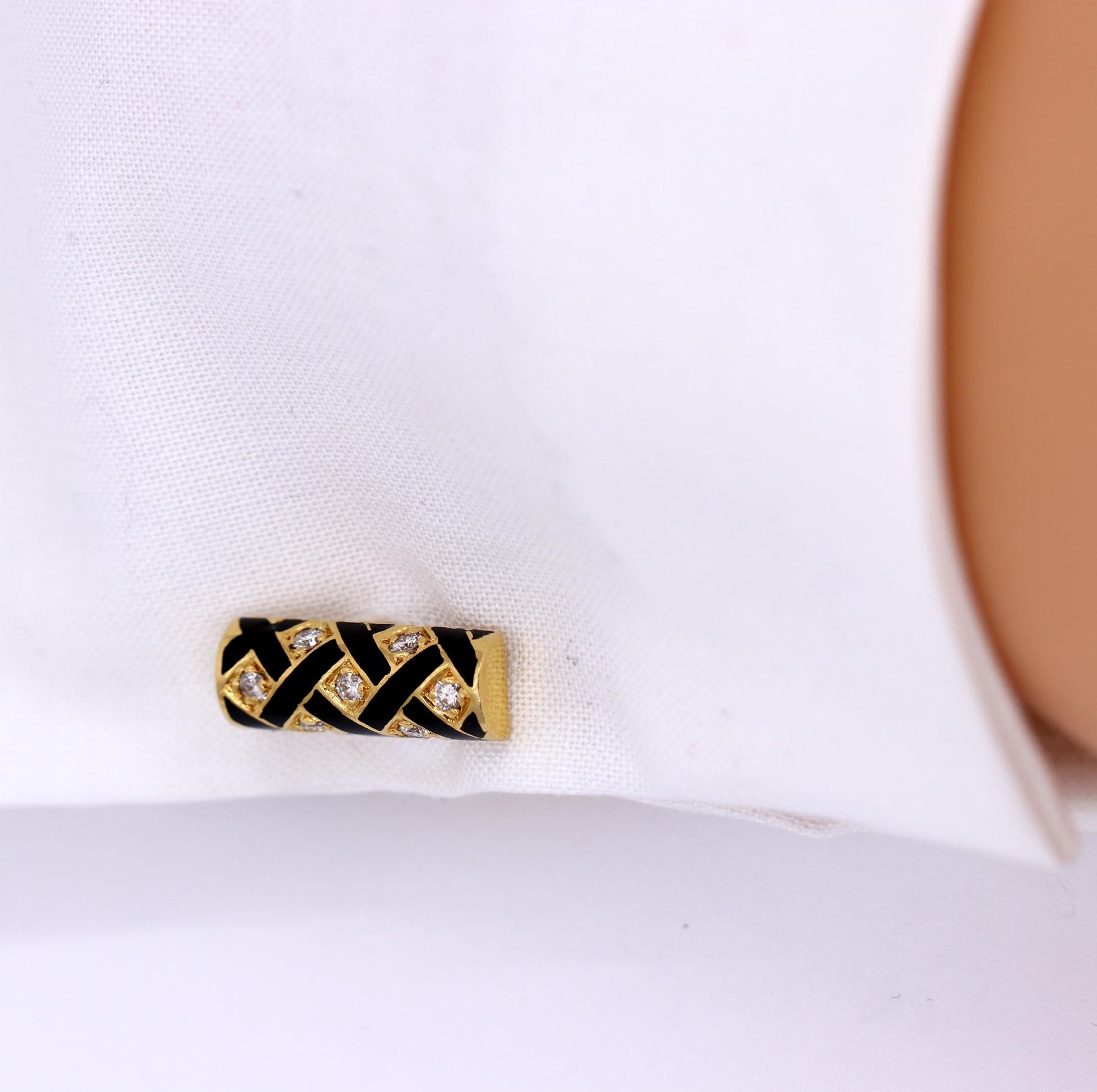 A gentleman's dress set, complete with a pair of cufflinks, and four buttons for a tuxedo shirt. The front of each cufflink has a black enamel lattice design, set with 7 round brilliant cut diamonds. The back of each cufflink is hinged for ease of