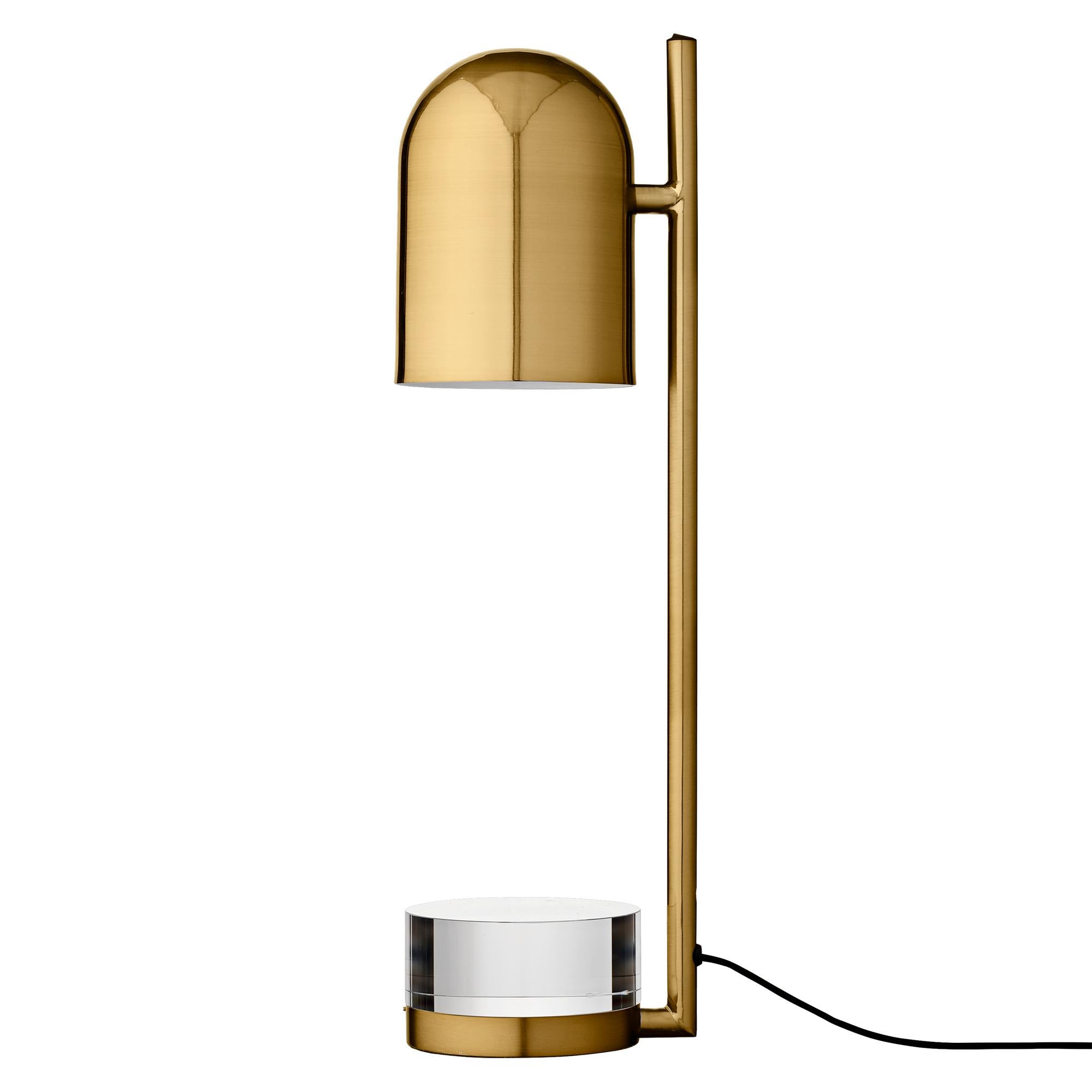 Gold cylinder table lamp
Dimensions: Diameter 12 x H 50 cm 
Materials: Glass, Iron w. brass plating & powder coating.
Details: For all lamps, the recommended light source is E27 max 25W&220/240 voltage. We recommend LED in order to avoid