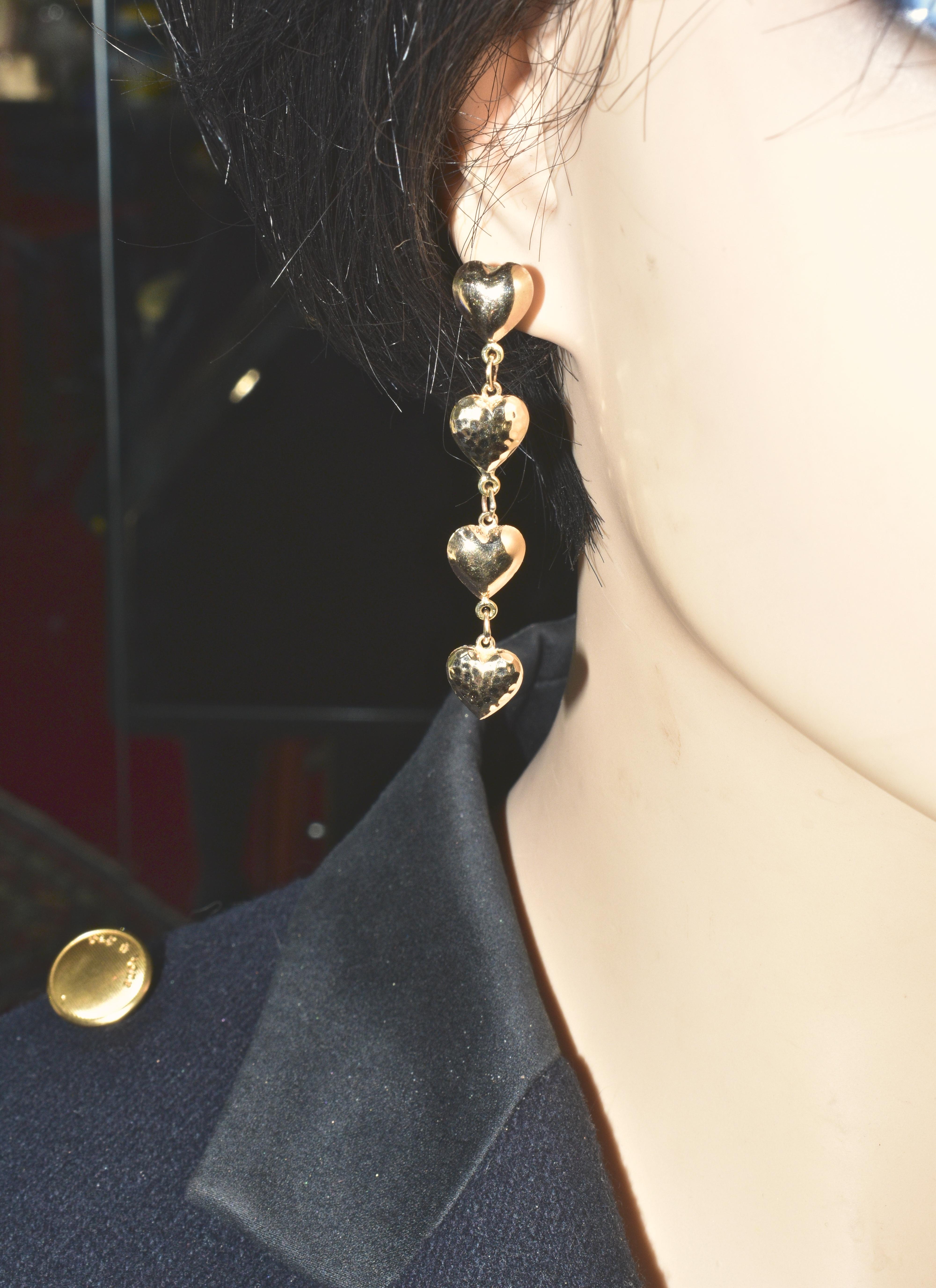 Gold Dangling Heart Motif Contemporary Earrings 1