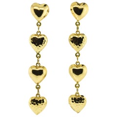 Gold Dangling Heart Motif Contemporary Earrings