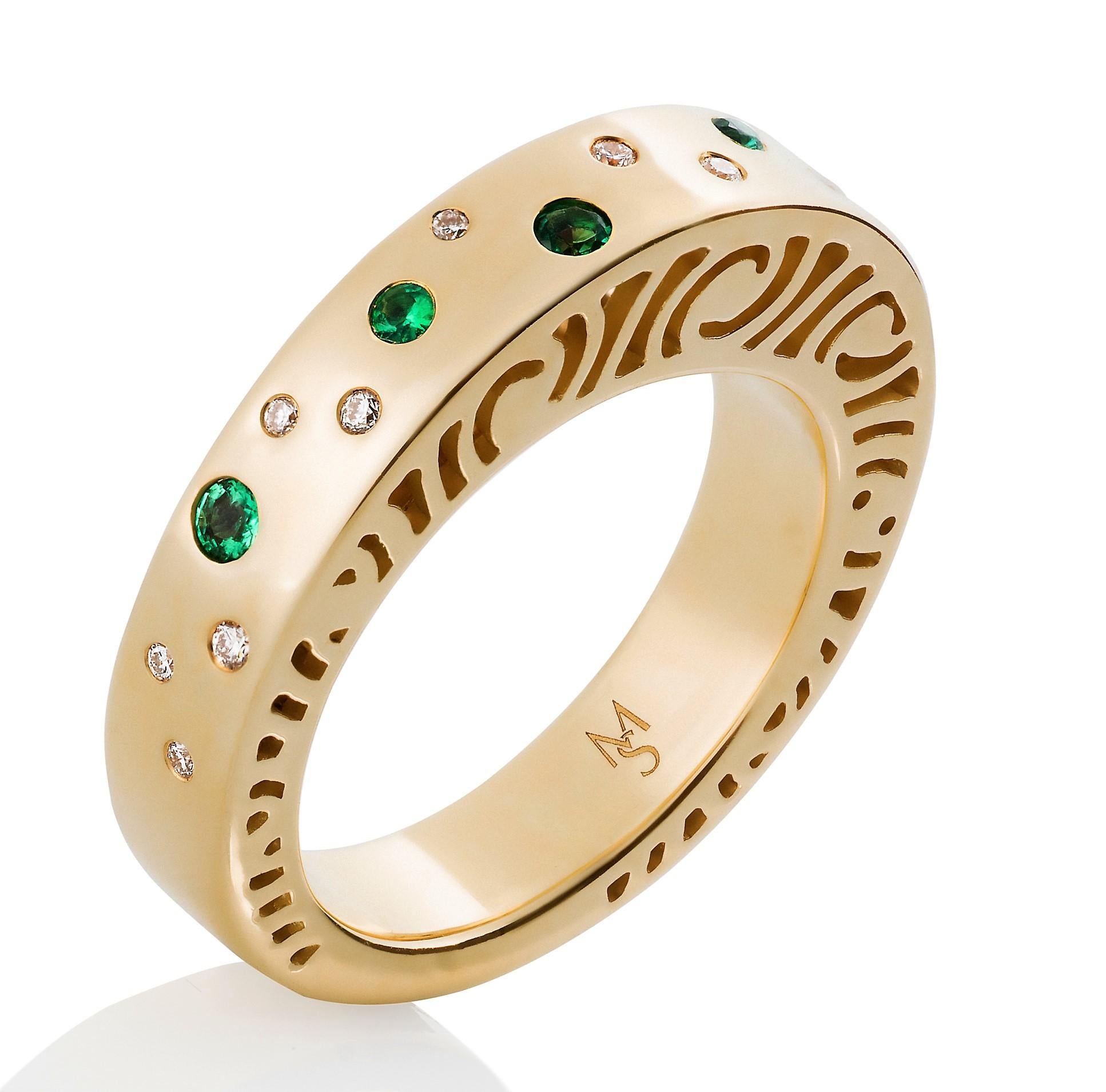 The sleek 5mm wide, diamond and emerald Shooting Stars stacking ring in 14ky is the wide band that was designed to stack with all the other rings in the Shooting Stars collection. The sides are high polished to almost a mirror finish and the