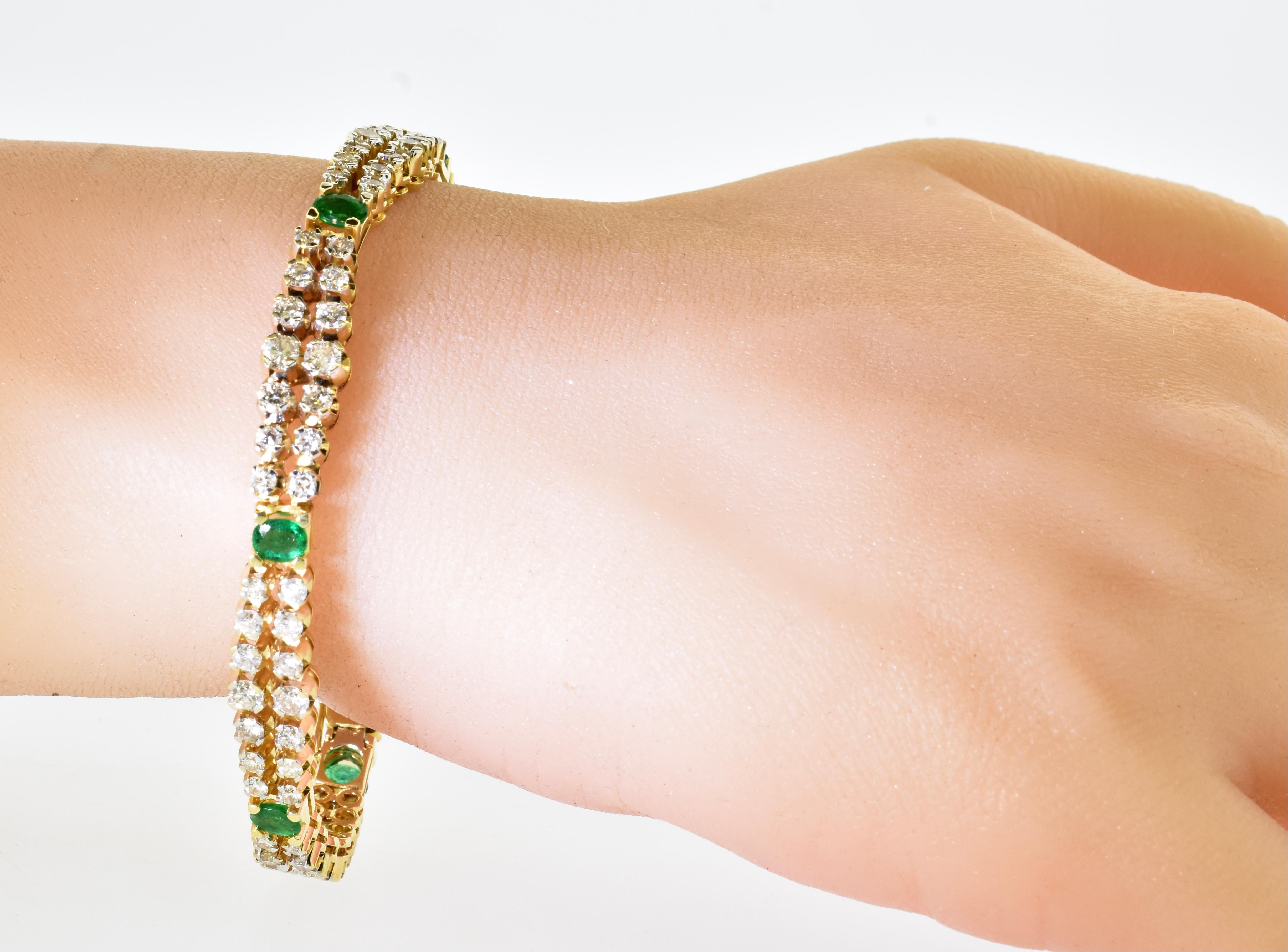 Emerald and diamond bracelet in yellow gold, this flexible bracelet holds 6 oval natural green emeralds , all well matched in this bright green color, they are estimated to weigh 1.25 cts. totally.  There are a total of 90 white diamonds all near