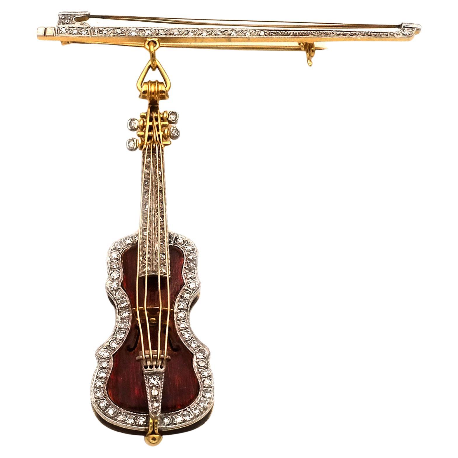 Gold Diamond and Enamel Stradivari Violin and Bow Brooch, circa 1930 For Sale