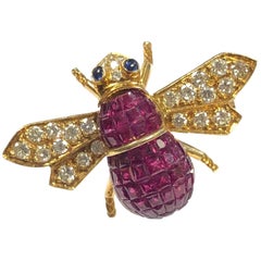 Gold Diamond and Invisible Set Ruby Bee Brooch