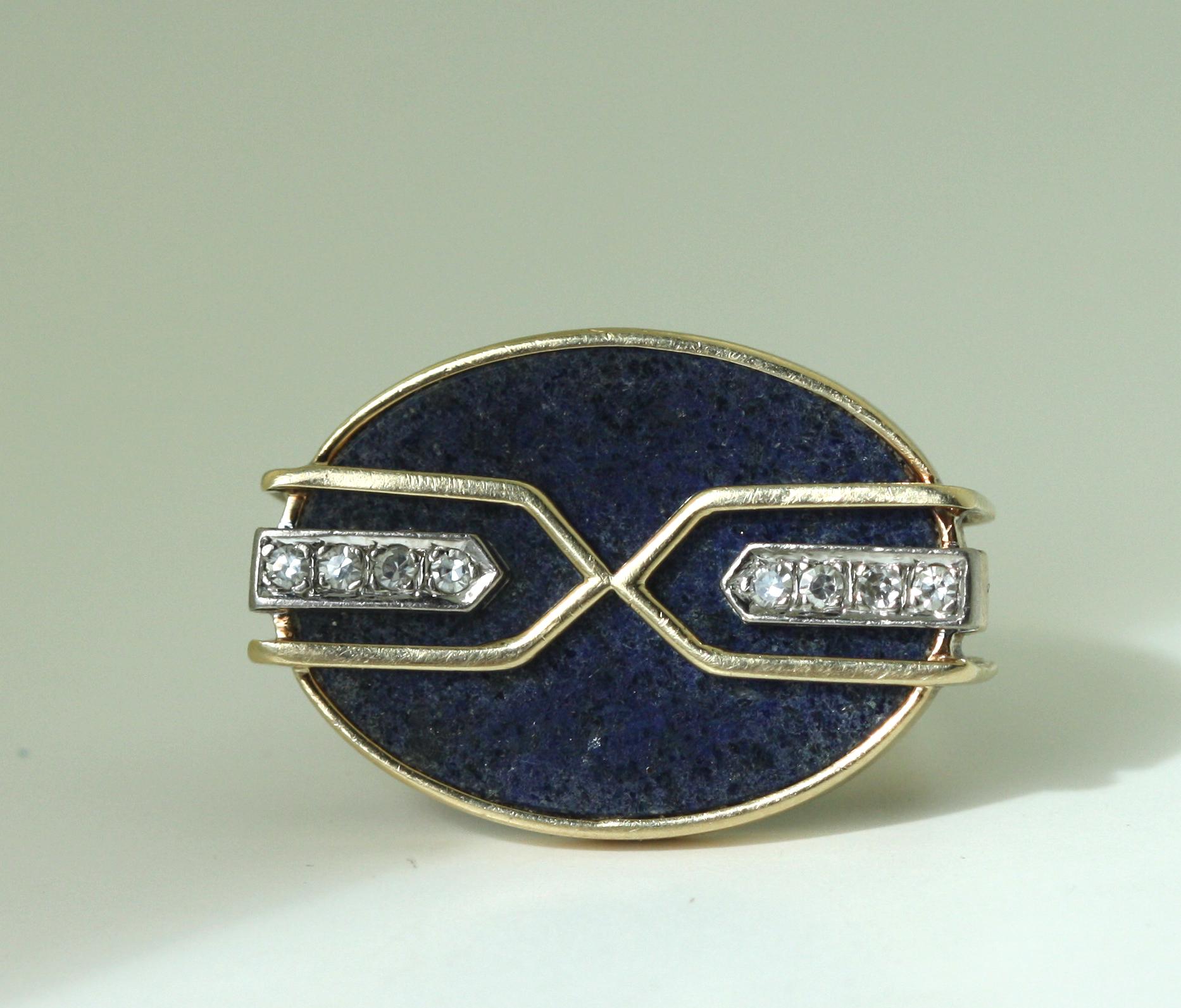 
Gold, Diamond and Lapis Lazuli Ring
Of round design, composed of lapis lazuli and round brilliant cut diamonds.
Diamonds weighing a total of approximately .40 carats
12 karat yellow gold
Total weight 7.50 grams
Size 5 1/2