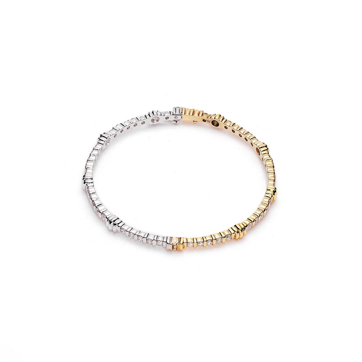 Bangle in 18kt white and yellow gold set with 45 diamonds 2.28 cts