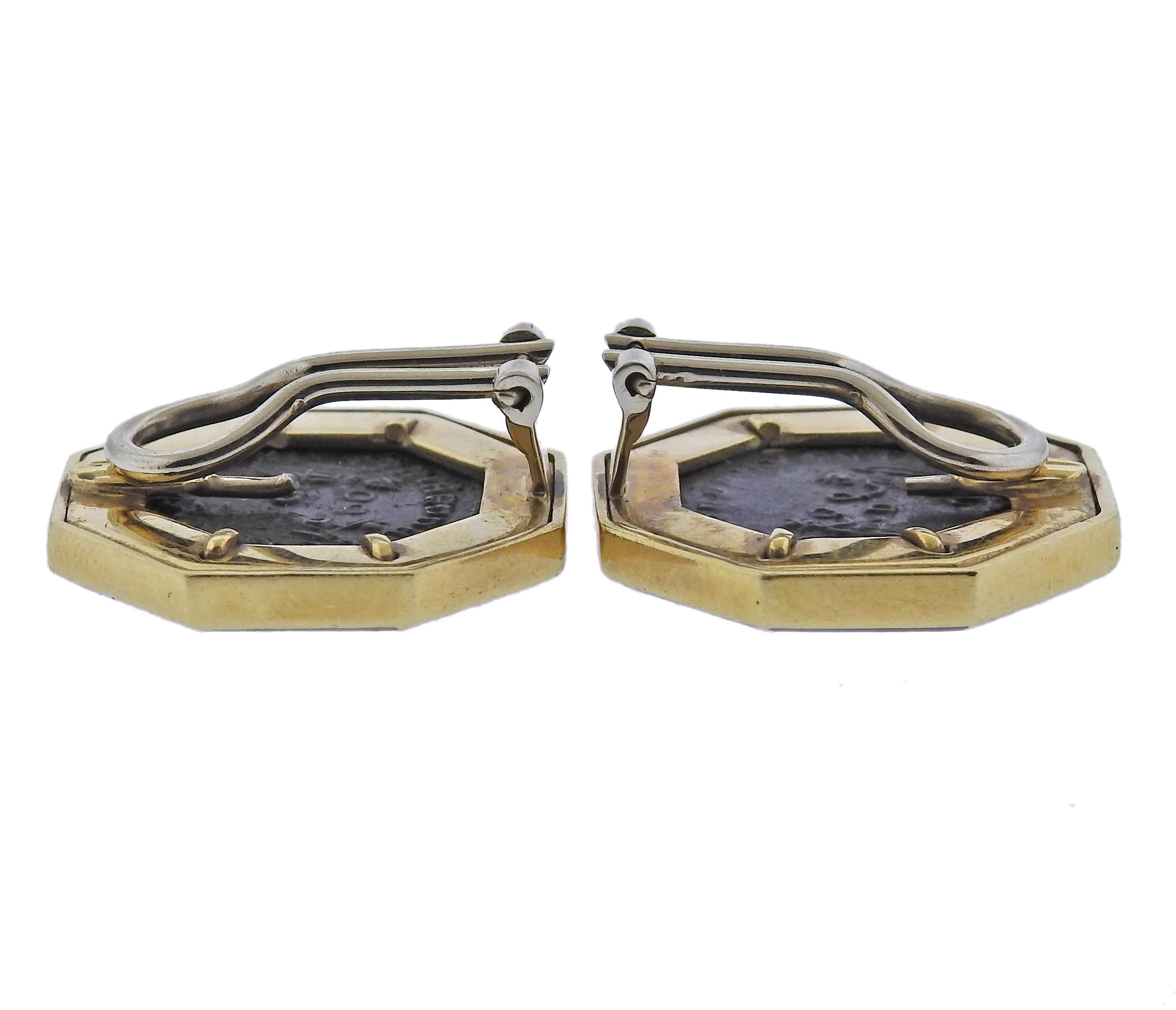Pair of 18k gold earrings, with coins in the center, surrounded with approx. 0.34ctw in diamonds and enamel. Earrings are 22mm x 22mm. Marked: 750. Weight - 19.7 grams.