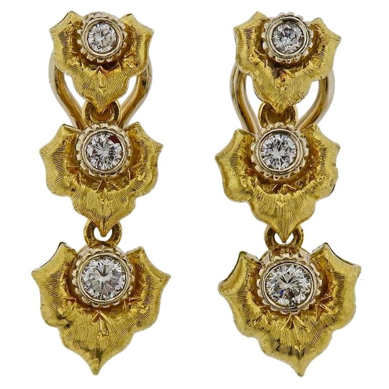 Boucles d'oreilles pendantes en or avec diamants en vente