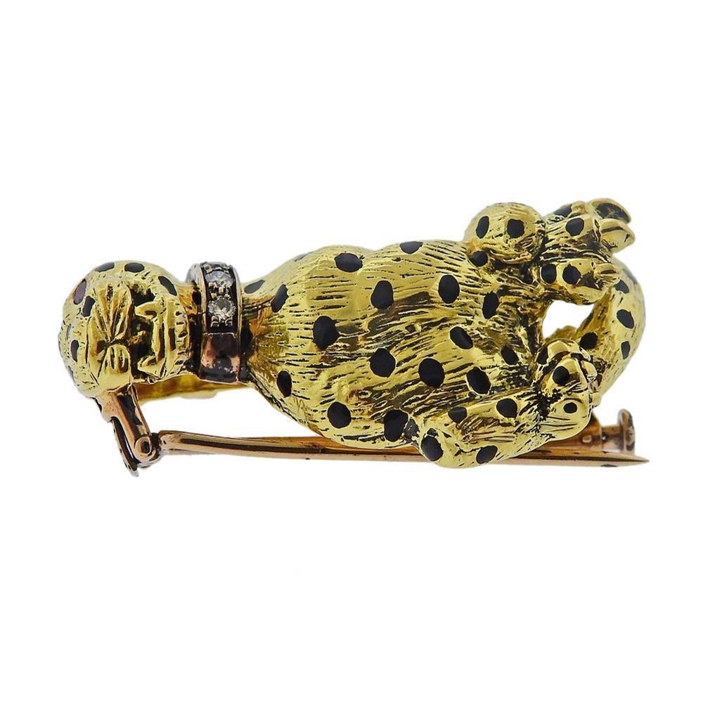 18k yellow gold panther brooch, decorated with enamel and diamond collar (approx. 0.24ctw), and one gemstone eye. Brooch is 42mm x 20mm. Marked 750 and with Italian mark. Weight - 22.5 grams.PB-03090