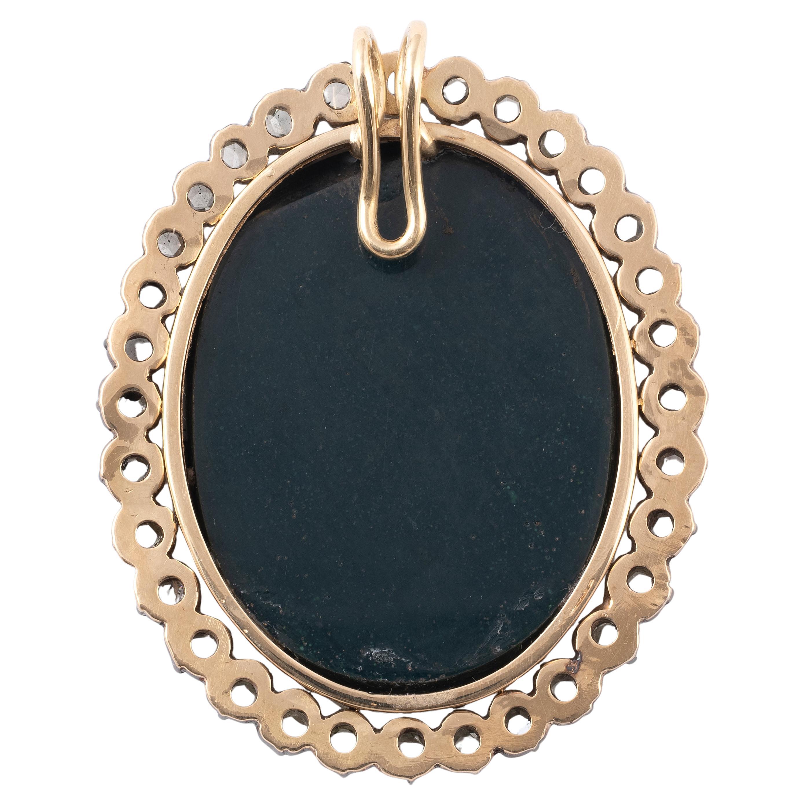 Gold diamond and green jasper Intaglio depicting a nude, seated male figure, placing his foot on an altar and holding a caduceus, probably Mercury 17th century
Intaglio : 32mm 
Size pendant is 42mm x 32mm
Weight: 18gr.


In Greek mythology, Mercury