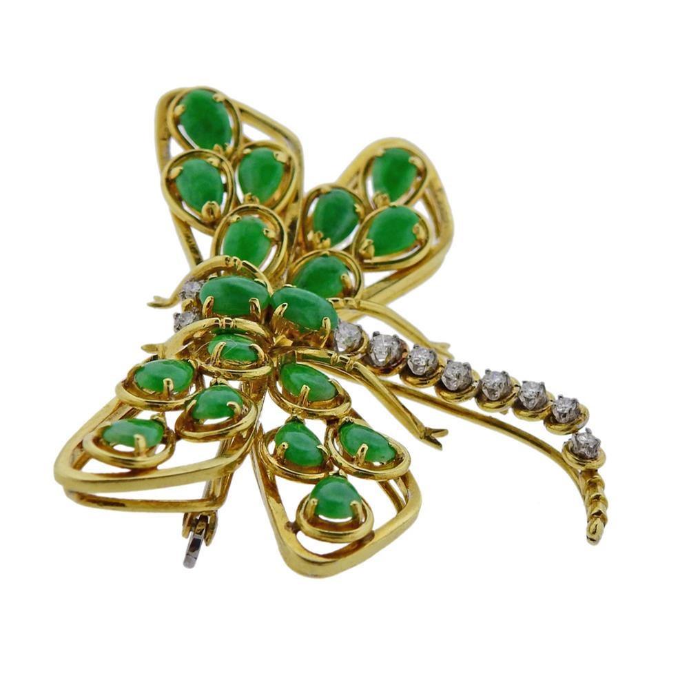 18k gold dragonfly brooch with jade and diamonds approx. 0.40ctw. Measures - 51mm x 45mm, dragonfly bottom tail is detached. Weights 19.7 grams. Marked with maker's mark and 18k. Dragonfly bottom tail is detached.