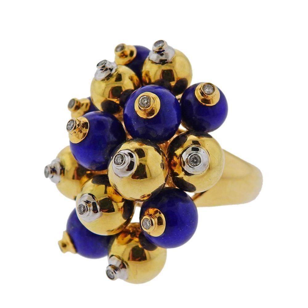 18k yellow gold cocktail ring, set with gold and lapis balls, each set with a diamond in the center (approx. 0.14ctw). Ring size - 7, ring top - 32mm x 25mm. Marked 750. Weight 21.9 grams.