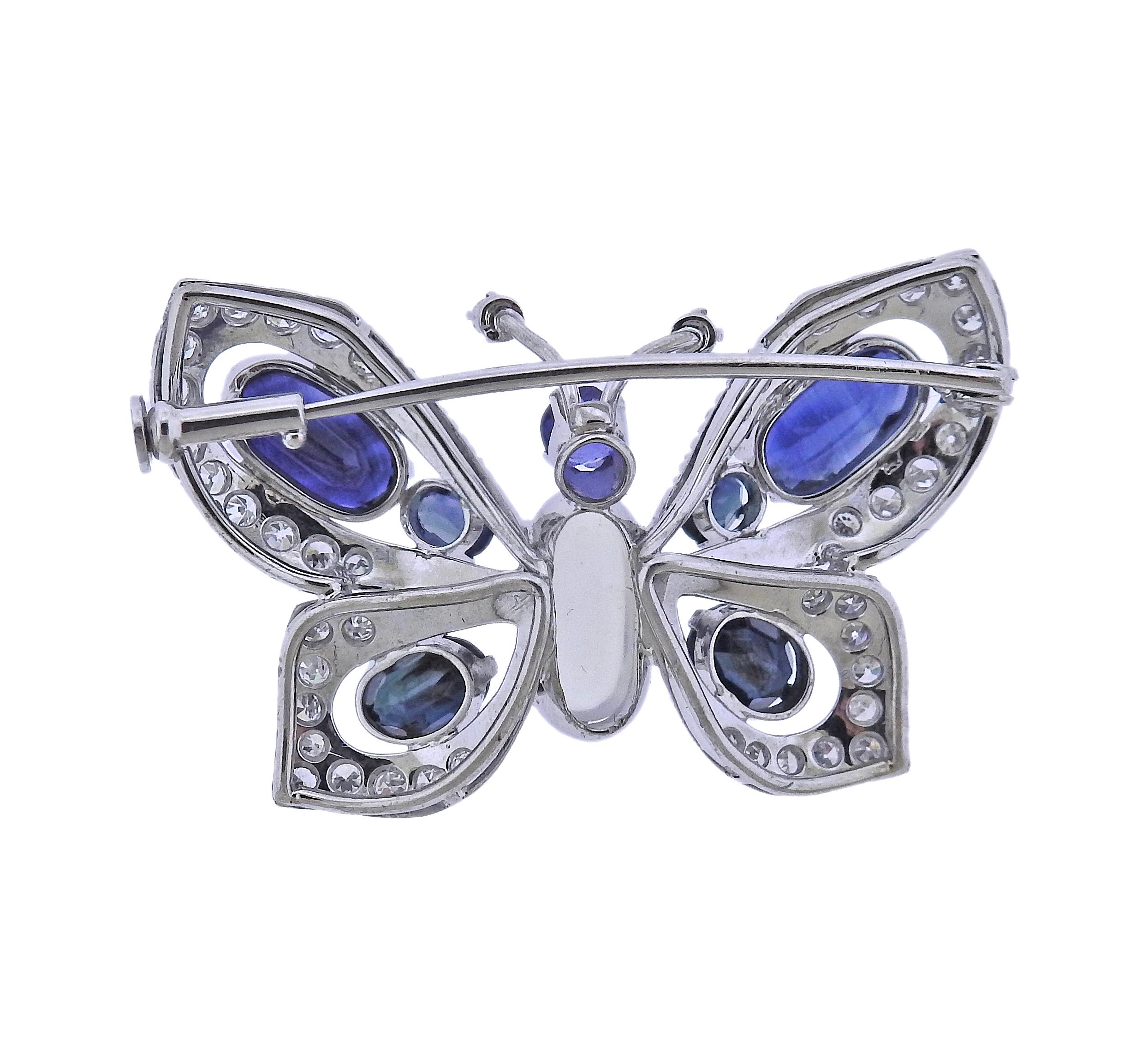 18k gold butterfly brooch, with sapphires, moonstone and approx. 0.52ctw in diamonds. Brooch measures 36mm x 23mm. Weight - 8.1 grams.