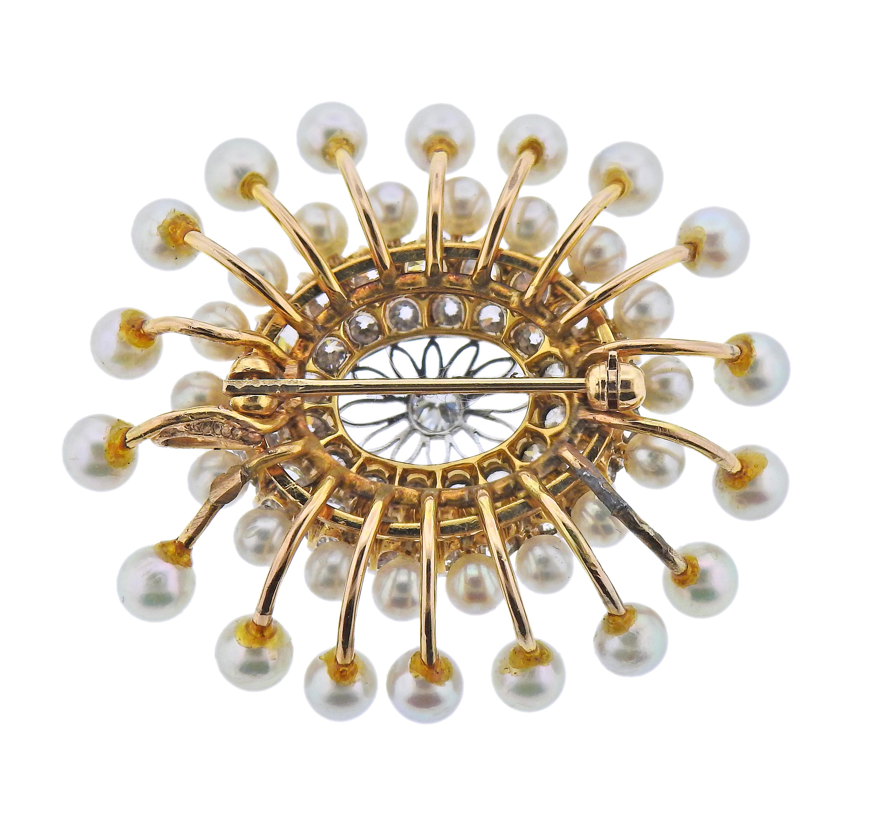 Vintage 14k gold brooch, with 3mm to 4.3mm pearls, and approx. 2.60ctw in diamonds. Brooch measures 40mm x 35mm. Weight - 12.5 grams. 