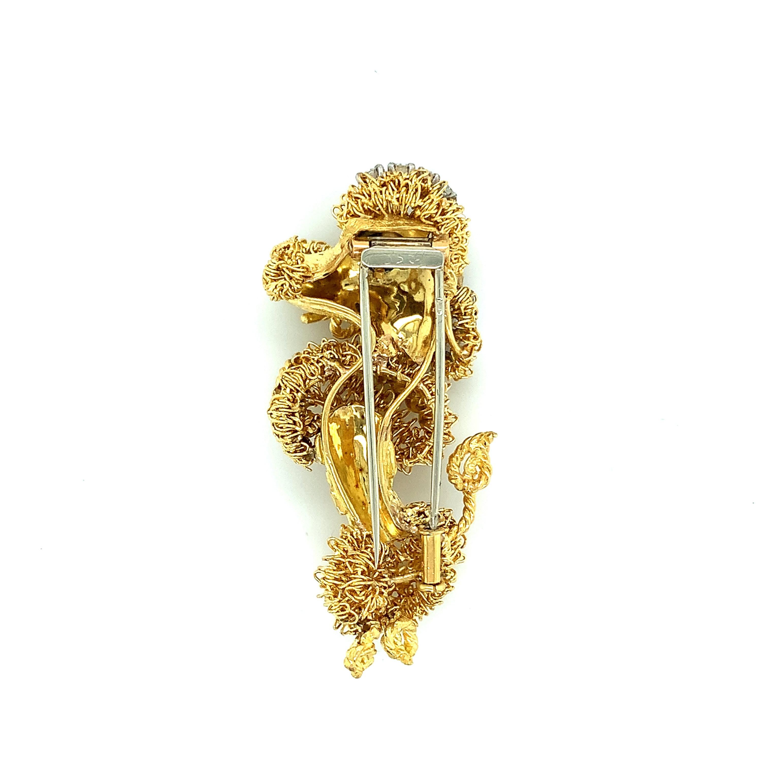 A poodle brooch made out of 18 karat yellow gold and white gold, featuring diamonds weighing approximately 0.50 carat. Circa 1970s. Total weight: 20.7 grams. Width: 1 inch. Length: 2 inches.