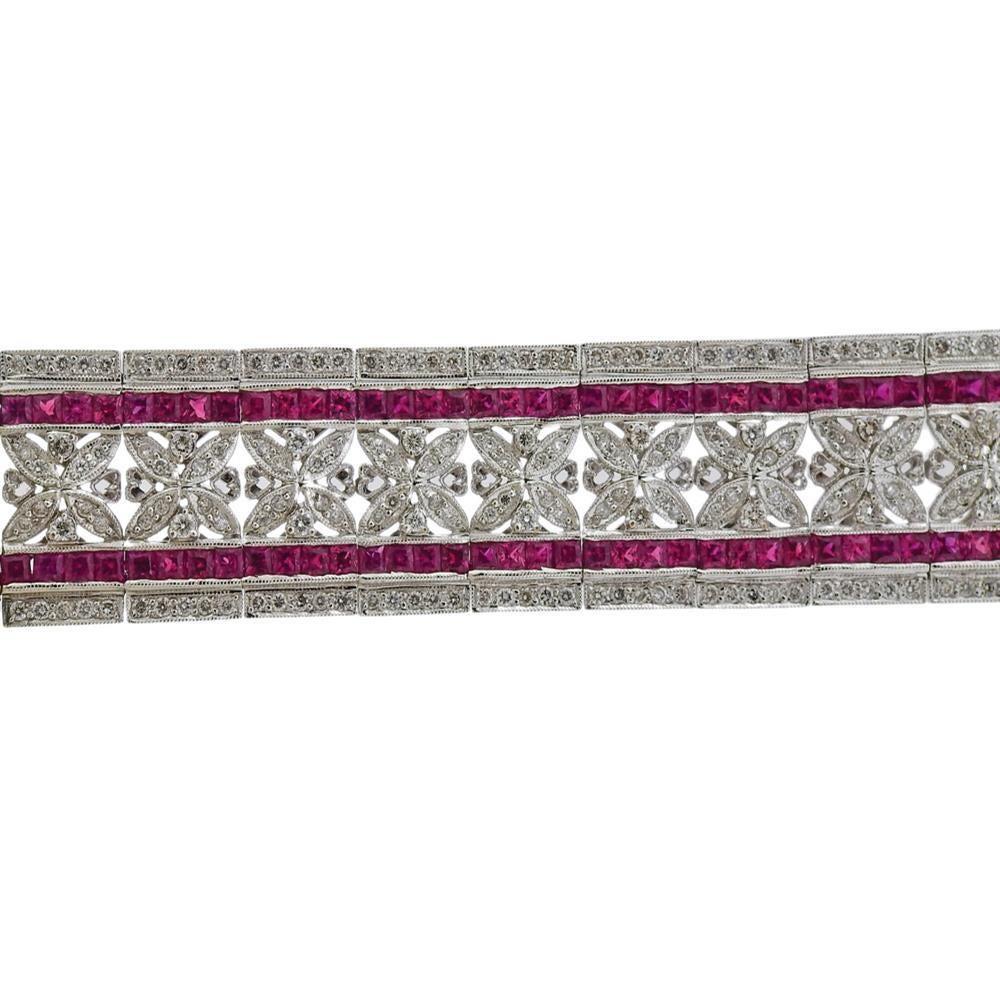 18k white gold bracelet, set with rubies (multiple stones are missing)  and approx. 3.20ctw in diamonds. Bracelet is 7