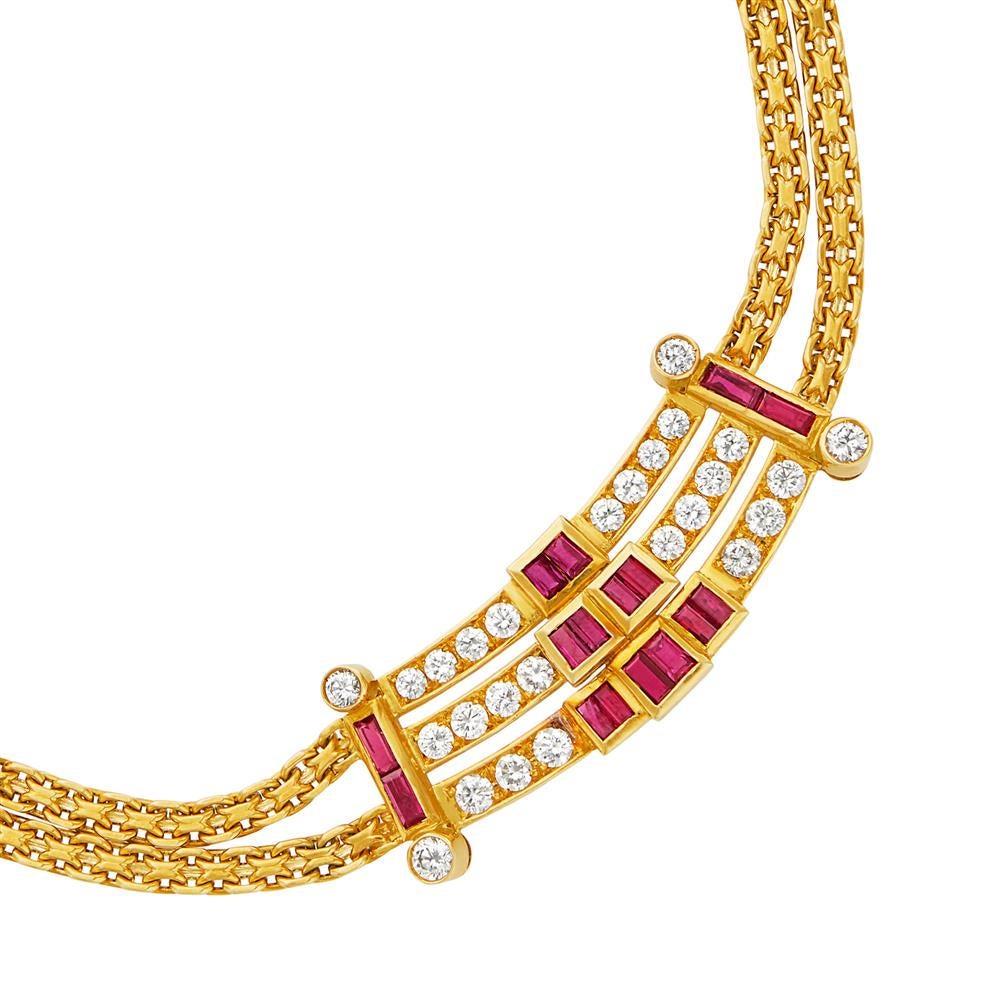 18k yellow gold necklace, set with approx. 3.35ctw in diamonds and  rubies. Necklace is 15