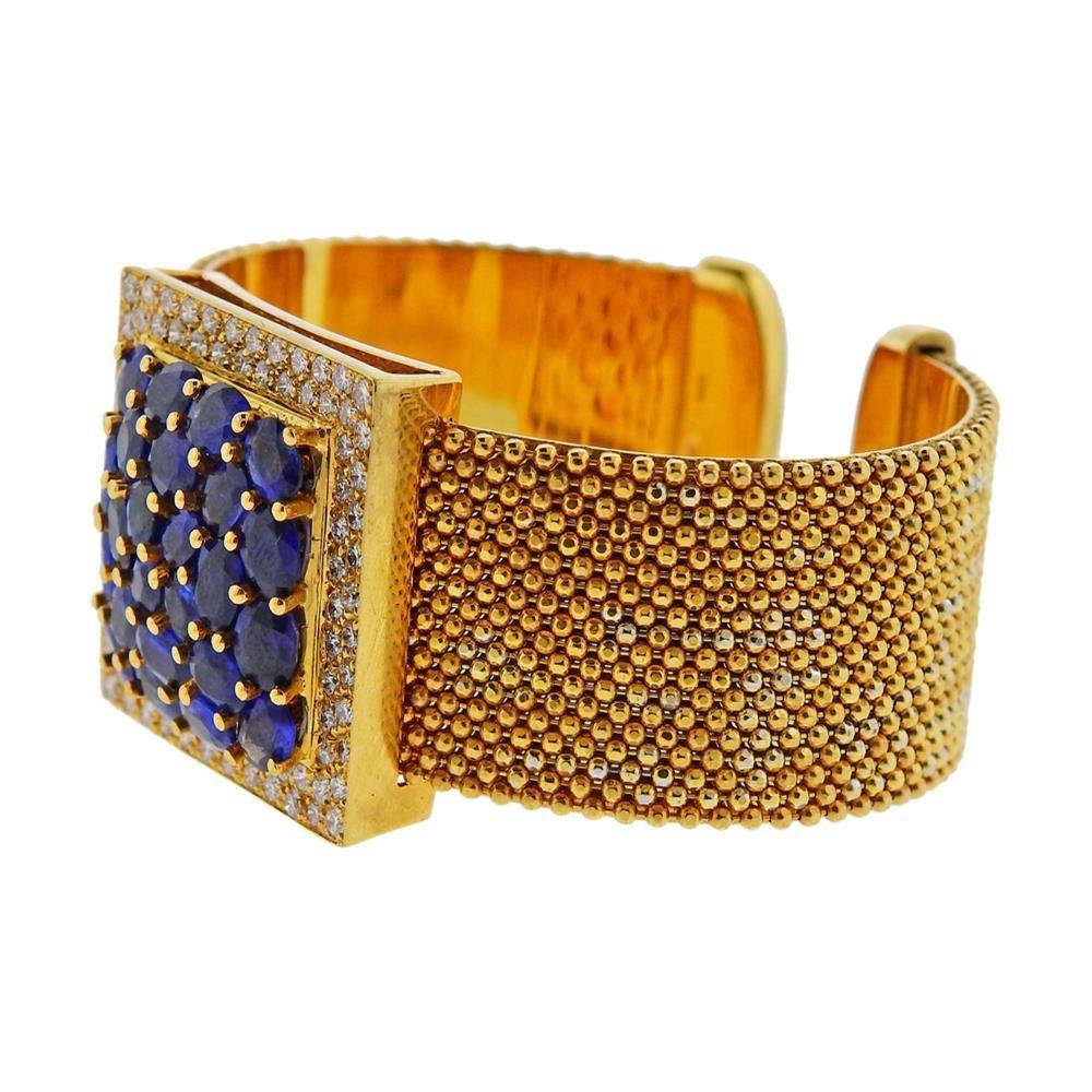 18k gold wide cuff bracelet with sapphires and diamonds approx. 2.50ctw. Measures - will fit approx. up to 7