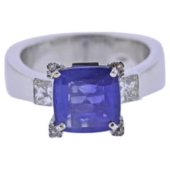 Anello in oro con diamante e zaffiro