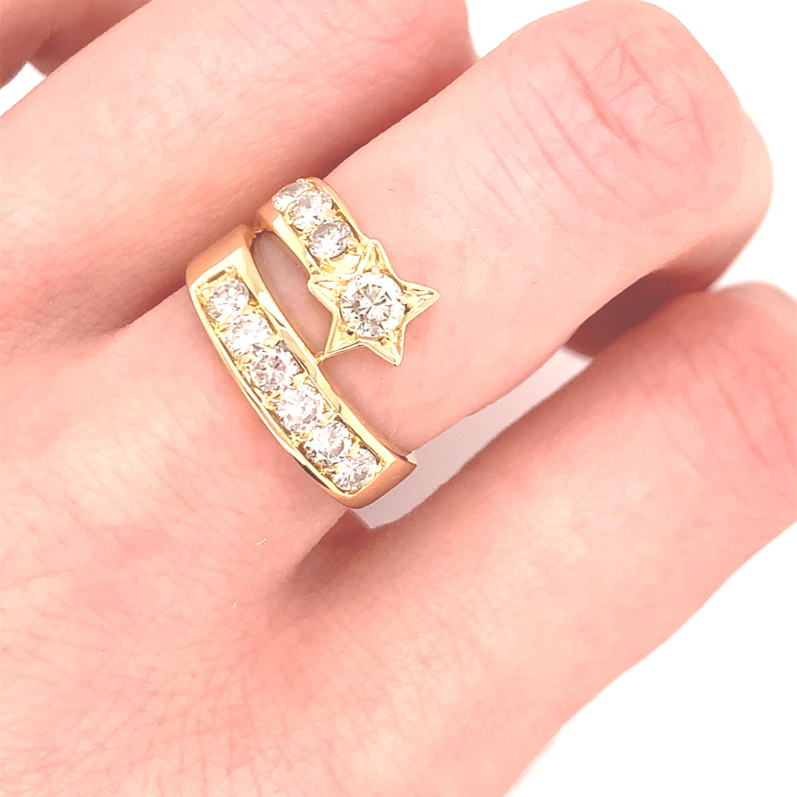 Striking and unique ring: a gold and diamond shooting star that wraps around the finger.  18K yellow gold; approximately 1.00 carat of brilliant diamonds, G-H color, VS clarity.  Size 7 and can be custom sized.  Very eye-catching and fun to