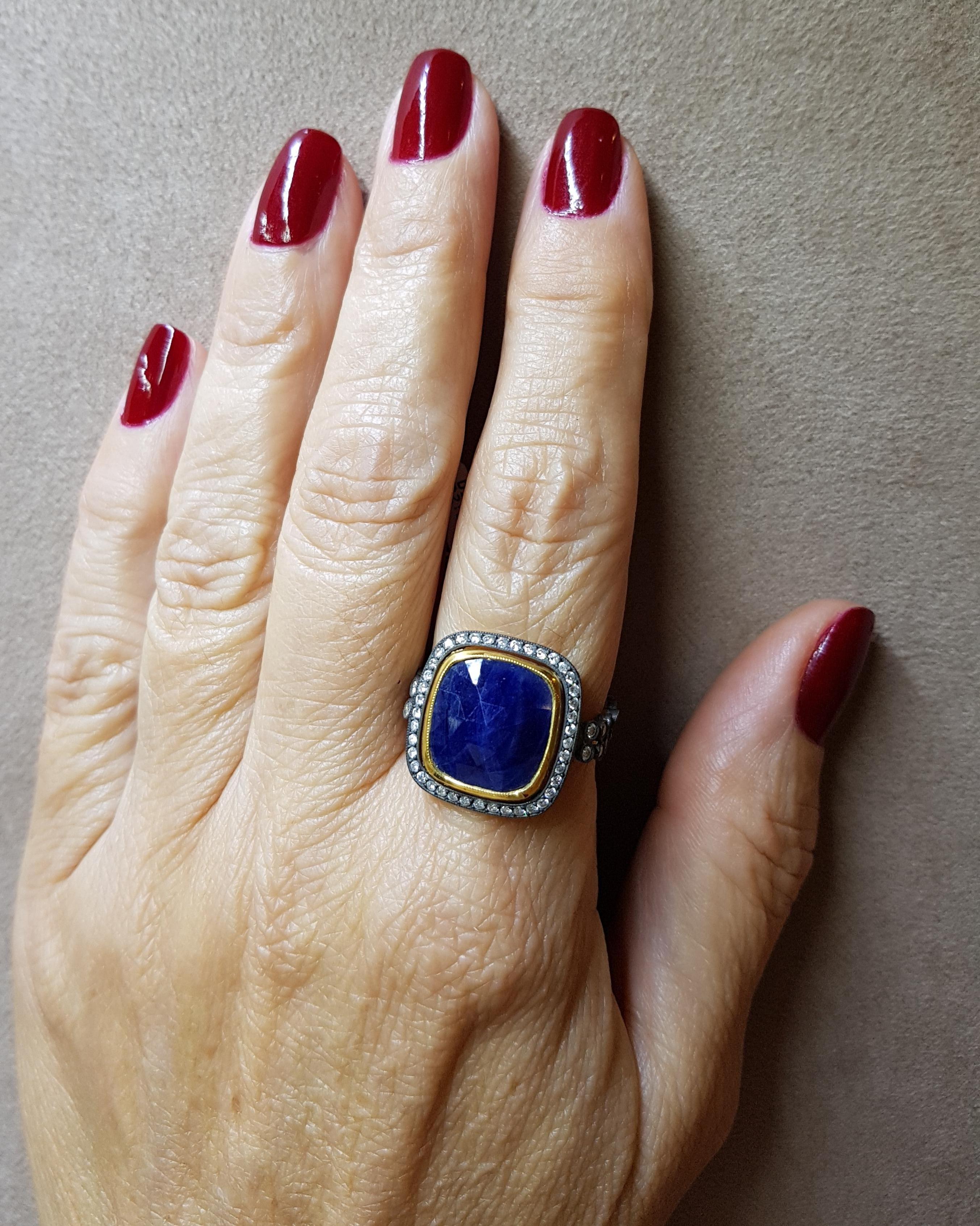 Yellow Gold Diamonds Slice Cut Blue Sapphire Ring
0,45 Carat Diamond
0,34 Carat Diamond
7.58 Carat Slice Cut Blue Sapphire
Ring Size :18



Rhodium plated