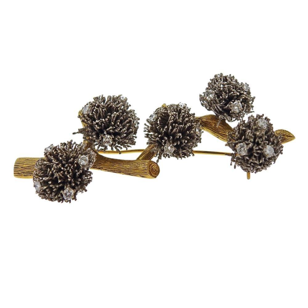 14k white and yellow gold thistle brooch. Measures 72mm x 30mm. Thistle top - 12mm to 17mm. Set with diamonds approx. 1.10ctw. Weights 27.3 grams. Marked 14k gold.